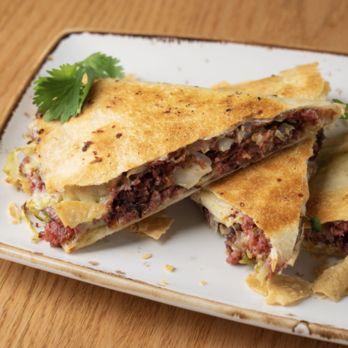 Quesadilla Corned Beef & Cabbage Crispy flour tortilla and Swiss cheese